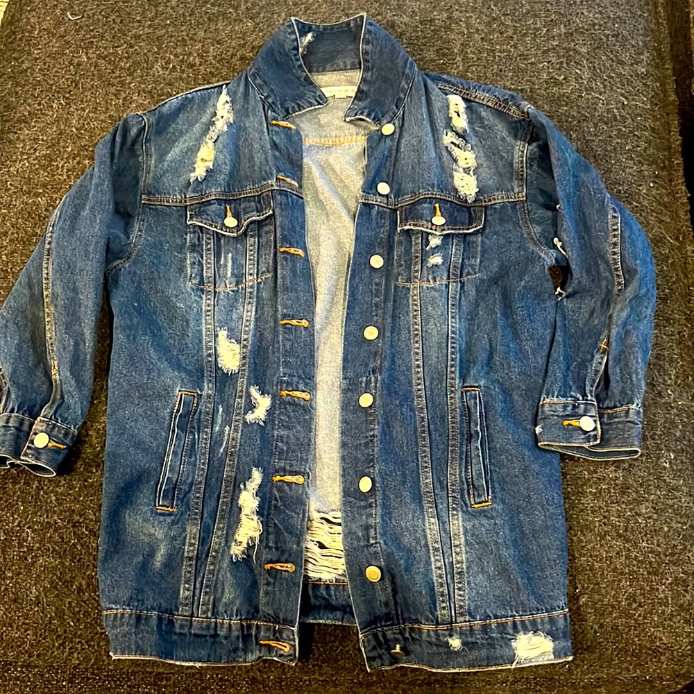The perfect oversized distressed jean jacket! For all seasons.